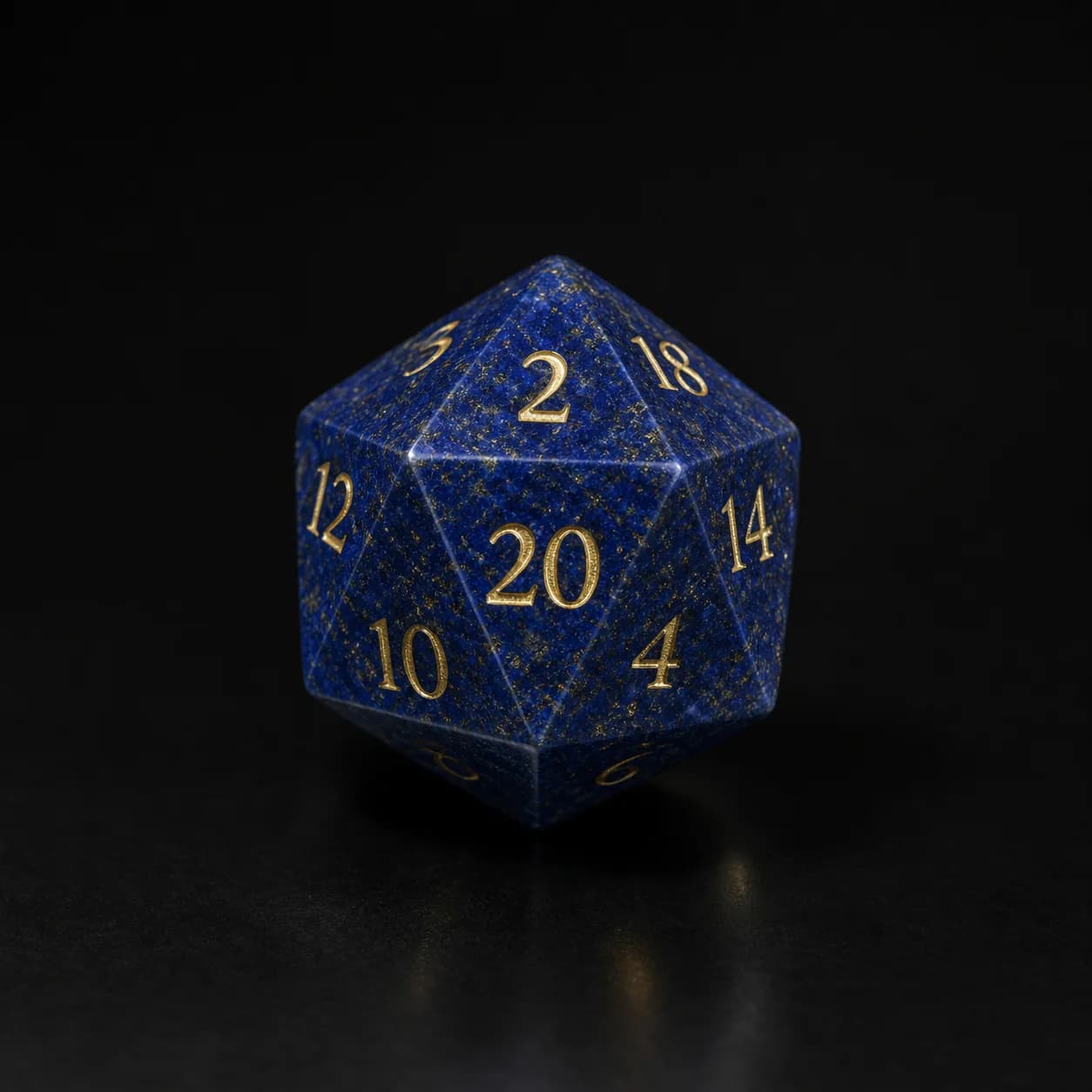 Lapis lazuli gemstone D20 showing engraved gold numbers